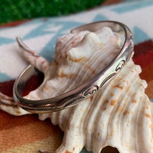 Sterling silver Native American bracelet 2 stamped bears & star burst. Marked